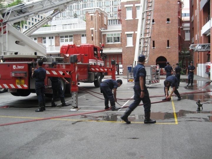 Fire Engines Photos - Image of Singapore fire fighters at work