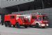 Oldtimer DAF next to a modern pump